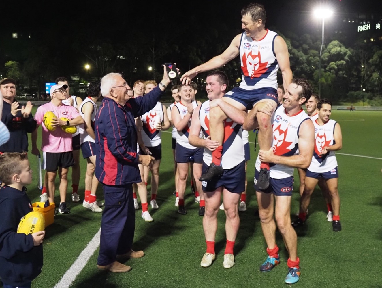 Brawn receiving medal